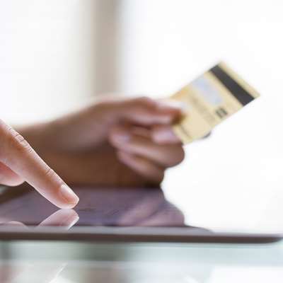 entering credit card information on a tablet